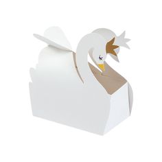 an open box with a white swan on it's head and wings sticking out