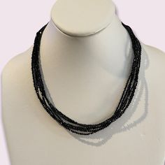 This Is An Absolutely Gorgeous 3-Strand Faceted Black Spinel Bead Sterling Silver Necklace. The Beads Are 2.0 To 2.5 Mm In Diameter. It Measures 34 Inches Long And Can Be Worn As A Long 3-Strand Or A Shorter 6-Strand Necklace. The Clasp And The 2.0 Inch Extender Chain Are Made Of Sterling Silver And Stamped 925 On The Catch Of The Clasp. It Is Also Stamped Bbj For The Manufacturer’s Mark. In Unused Vintage Condition. Formal Multi-strand Black Beaded Necklaces, Formal Multi-strand Black Beaded Necklace, Formal Black Multi-strand Beaded Necklaces, Elegant Adjustable Black Crystal Necklace, Formal Black Multi-strand Beaded Necklace, Elegant Beaded Multi-strand Crystal Necklaces, Elegant Multi-strand Beaded Crystal Necklaces, Elegant Rondelle Gemstone Beads, Elegant Multi-strand Beaded Crystal Necklace