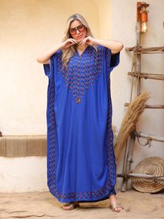 An elegant and stylish caftan will make you feel like African royalty. It's extremely elegant with a dash of colorful cotton embroidery adorning the kaftan. Ideal for plus size women as well. Made of extremely soft fabric to make you feel free and beautiful at the same time.  This Kaftan is ideal to wear for any casual occasion. Whether taking a trip down the shopping lane, or home-based kitty parties, or about anything else, wearing this dress will make you feel classy and comfortable. Fabric : Bohemian Tunic Thobe, Free Size Tunic Abaya, Embroidered Floor-length Kaftan For Festivals, Traditional Long Free Size Kaftan, Embroidered Abaya For Eid Vacation, Free Size Embroidered Tunic Kaftan, Long Embroidered Free Size Kaftan, Traditional Free Size Thobe For Vacation, Long Embroidered Free-size Kaftan