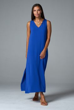 Our best-selling maxi dress is a summer staple. From weekend brunch to beach weddings, you'll wear this flowing style everywhere this season. ✓ All-Day Comfort ✓ Travel Friendly ✓ Day to Night ✓ Machine Washable DETAILS V neck Side slits FIT Regular fit True to size Model is 5'8" and wears size S MEASUREMENTS Length: 52" from shoulder (size S) FABRIC + CARE 100% polyester airflow Cold water wash on delicate. Line dry. Santorini Dress, Dresses Royal, Weekend Brunch, Instagram Outfits, Capri Blue, Outerwear Outfit, Beach Weddings, Coral Blue, Summer Staples