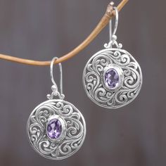 Made Sudiari is an artisan from Indonesia who works alongside her family to create beautiful pieces of jewelry. She designs this pair of dangle earrings from sterling silver with Balinese openwork motifs surrounding over two carats of oval-shaped amethyst stones. Fillagree Jewelry, Country Jewelry, Round Dangle Earrings, Labradorite Earrings, Silver Dangle Earrings, Sterling Silver Dangle Earrings, Gold Accent, Floral Earrings, Silver Earrings Dangle