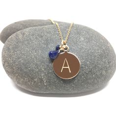 "This sapphire initial necklace is 14k gold filled, sterling silver and rose gold filled and is custom made with two genuine sapphire gemstones. Sapphire is the birthstone for September. A personalized necklace is a great gift for yourself or someone you know. 16\" or 18\" 14k gold filled/sterling silver/ or rose gold filled chain (use drop down menu to choose) 4 by 6mm faceted sapphire teardrop 2.5mm sapphire rondelle 12.5MM 14k gold filled/sterling silver/ or rose gold filled disc (choose how Everyday Sapphire Birthstone Jewelry, Everyday Gold Sapphire Jewelry, Personalized Blue Sterling Silver Jewelry, Blue Sterling Silver Jewelry For Personalized Gift, Hypoallergenic Sapphire Jewelry As Gift, Hypoallergenic Sapphire Jewelry For Gifts, Blue Round Charm Necklaces For Everyday, Everyday Blue Round Charm Necklaces, Everyday Sapphire Sterling Silver Jewelry