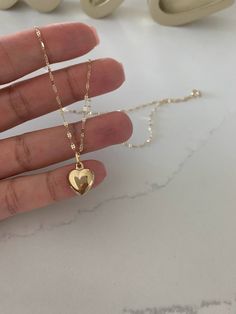 14KT Gold Heart Charm | 6mm, 10mm Puffed Heart Charm | Small Heart Charm | Real Gold Heart Pendant | Available in Yellow, White & Rose Gold | Large Pendant | Heart Necklace⁙ Materials: 14K Yellow Gold, Hollow Heart⁙ Pendant Dimensions: 12MM Width by 15MM Height, 4MM hoop ring diameter⁙ Chain Dimensions: 1.7 MM thick and 16", 18", 20", & 22" in length, it is a mirror diamond cut necklace MATERIALSAll chains are made of 14K Solid Gold HOW TO FIND YOUR PERFECT FITYour neck size is probably the most Small Gold Heart Necklace, Gold Necklace Locket, Gold Heart Pendant Necklace, Small Chains Gold With Pendant, Cute Necklaces Gold, Latina Gold Jewelry, Necklace For Girlfriends, Heart Necklace Aesthetic