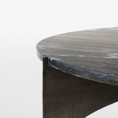 a close up of a metal table on a white background with no people around it