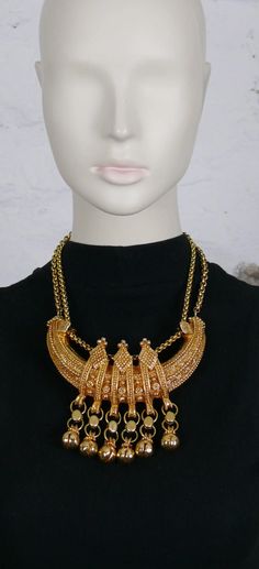 For Sale on 1stDibs - CHRISTIAN LACROIX vintage gold toned Etruscan revival resin plastron necklace featuring an opulent design of friezes, quilted diamond-shaped elements and Vintage Metal Temple Necklace For Festive Occasions, Bohemian Gold Choker Bridal Necklace, Bohemian Gold Bridal Choker Necklace, Traditional Antique Gold Metal Necklace, Gold Bohemian Temple Necklace With Intricate Design, Bohemian Gold Temple Necklace With Intricate Design, Gold Jeweled Bridal Necklace For Ceremonial Use, Gold Jeweled Bridal Necklace For Ceremonial Occasions, Bohemian Gold Bridal Necklace