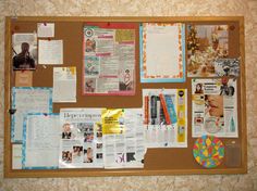 a bulletin board covered in papers and pictures