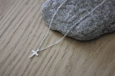 "Necklace in sterling silver small cross charm - minimalist silver necklace - silver cross choker Minimalist style fine sterling silver necklace. Necklace made with a chain in sterling silver 925/1000 embellished with a small cross pendant in sterling silver also. Silver cross size: 10mm X 7mm Adjustable length with the 4cm extension chain. Several lengths available. Feel free to contact me if you want another length. ♦ All my jewelry is made to order according to the dimensions you have chosen. Minimalist Silver Necklace, Minimalist Necklace Silver, Cross Choker Necklace, Cross Choker, Small Crosses, Necklace Necklace, Pretty Gift, Cross Charms, Choker Necklaces