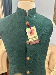 **Visit our store for full collection: https://www.etsy.com/shop/DesiGiftsUSA ** *This sleeveless jacket is crafted with intricate embroidery and sequins. It is lightweight yet high on durability carrying a distinct texture and appearance.  It enhance the elegance of men's wear from formal to casual, wedding, and other auspicious occasions. * The jacket is also known as Indian or Ethnic Style Jacket, Collar Waistcoat, Sadri, Nehru or Modi Jacket. *Pair it with Kurta-Pajama for ethnic look. Pair it with Shirt & Trousers to give a Indo-Western look. *Fabric : Silk blend Design: J- 1458 Actual color of the dress may slightly vary due to the screen resolution.  Refer the size chart for measurements Care: Dry cleaning is recommended Disclaimer: -Actual color of the dress may slightly vary due t Mens Indian Wear, Jacket Collar, Nehru Jacket, Ethnic Looks, Kurta Pajama, Western Look, Nehru Jackets, Intricate Embroidery, Indo Western