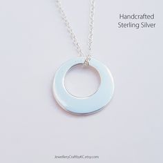 "We create 925 sterling silver jewellery for you. It symbolizes the never ending circle of love and friendship. Versatile and Minimalist Design. Charm: 1.4 cm height Chain: 16\" or 18\" Clasp type: spring ring All made from 925 sterling silver.  No nickel or steel. Not sliver plated. Choose the length of your sterling silver chain. Gecko Necklace: https://www.etsy.com/uk/listing/735109560 More Necklaces: https://www.etsy.com/uk/shop/JewelleryCraftbyKC?ref=simple-shop-header-name&listing_id=729394742&section_id=27383128 Sterling Silver Earrings: https://www.etsy.com/uk/shop/JewelleryCraftbyKC?ref=simple-shop-header-name&listing_id=729394742&section_id=27383132 Pearl and Gemstone Jewellery: https://www.etsy.com/uk/shop/JewelleryCraftbyKC?ref=shop-header-name&listing_id=729419370&section_id=2 Sterling Silver Full Circle Necklace For Anniversary, Modern Sterling Silver Infinity Jewelry, Silver Full Circle Jewelry For Everyday, Minimalist Sterling Silver Open Circle Necklace, Modern 925 Stamped Jewelry As Gift, Sterling Silver Round Pendant Jewelry For Everyday, Sterling Silver Round Pendant For Everyday, Modern 925 Stamped Jewelry For Gift, Minimalist Full Circle Silver Jewelry