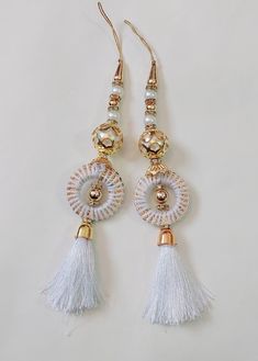 Hand made Women Hand Made Tassels Lehanga Latkan Hand  Work New Fancy Designer Tassel Fabric Silk   2 PC   Libas Fashion latkan  Beautiful Pair of Latkans & Brooch Accessory For You Decorative Products. In Indian These Latkans Are Normally Used as The Accessory For Lengha & Sari Blouse On The Back, But These Can Be Used in Many Other Ways to Metal & Pearl scan be used at an door. Rajasthan is a State in India for these kind of Art works Ethnic, Casual and Party Wear Designs Lahenga party latkan Luxury Latkans Earrings For Festivals, Luxury Chandbalis With Latkans For Wedding, Luxury Traditional Wear With Latkans, Cheap Latkans Drop Earrings, Luxury Necklace With Latkans For Gift, Cheap Party Chandelier Earrings With Latkans, Affordable Celebration Danglers With Latkans, Cheap Latkans Necklaces For Gift, Cheap Gold Necklace With Latkans