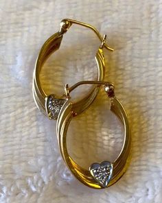 "Beautiful 14K Yellow Gold 1\" Diamond Heart Hoop Earrings Beautiful hoop earrings with a heart on bottom of hoop with genuine diamonds! Earrings measure approximately 1\" long x 6/8\" wide. Weight is 2.2 grams Absolutely beautiful! Please message me with any questions Shipped insured in a gift box I guarantee item to be exactly as described and pictures." Small Hoop Earrings For Anniversary On Valentine's Day, Small Hoop Earrings For Valentine's Anniversary, Hoop Jewelry For Anniversary On Valentine's Day, Hoop Jewelry For Valentine's Day Anniversary, Gold Hoop Earrings For Valentine's Day Anniversary, Gold Small Hoop Heart Earrings For Anniversary, Pierced Hoop Heart Earrings For Anniversary, Valentine's Day Yellow Gold Double Heart Hoop Earrings, 14k Gold Heart-shaped Hoop Earrings For Anniversary