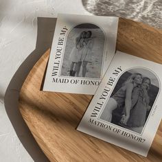 two magazines sitting on top of a wooden tray