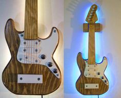 two guitars made out of wood and leds are shown side by side, one is shaped like an electric guitar