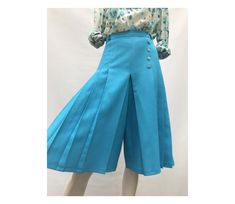 "1970s blue turquoise pleated skirt pants  size eu 38- uk 10 - us  6  label : ASCOT paris polyester  no lining  M E A S U R E M E N T  S waist : 64cm //25.2\" inner leg :38cm /:15\" height :66cm //26\" hips : 94cm //37\" excellent vintage condition" Blue Pleated Hem Summer Bottoms, Blue Pleated Hem Bottoms For Summer, Vintage Non-stretch Bottoms For Spring, Summer Pleated Full-length Bottoms, Pleated Full-length Summer Bottoms, Summer Blue Bottoms With Pleated Hem, Spring Accordion Pleated Pants, Pleated Full Length Summer Bottoms, Summer Full-length Pleated Bottoms