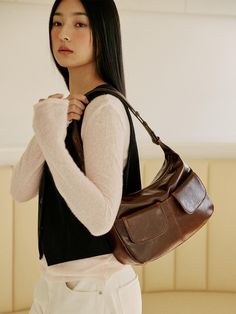 It is a daily bag brand that can be used comfortably every day.- Practical design with two out pockets- Open and close with the hidden magnet- Can be worn as a shoulder bag or a cross bag- Vintage and natural mood Brown On-the-go Shoulder Bag With Pockets, Everyday Baguette Bag With Pockets, Chic Brown Shoulder Bag With Pockets, Modern Brown Bag With Pockets, Everyday Baguette Shoulder Bag With Pockets, Brown Shoulder Bag With Pockets, Modern Brown Baguette Bag For Everyday Use, Everyday Shoulder Bag With Flat Pocket, Versatile Brown Baguette Bag For Travel