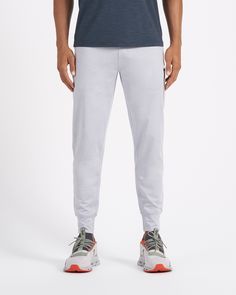 A fresh take on athleisure and a staple in your wardrobe, the Sunday Performance Joggers are premier in fit, function and soft stretch. This jogger style will keep you moving with less bulk around your ankles. | Vuori Sunday Performance Jogger Pants | Platinum Heather | XXL Vuori makes premium performance apparel inspired by the active Coastal California lifestyle; an integration of fitness, surf, sport, and art. Breaking down the boundaries of traditional activewear, we are a new perspective on 4-way Stretch Sportswear Joggers With Side Pockets, Functional Athletic Fit Joggers With Elastic Waistband, Sports Joggers With Elastic Waist And Tapered Leg, Athleisure Joggers With Moisture-wicking, Functional Tapered Leg Activewear With Side Pockets, Sportswear Bottoms With Elastic Waistband In Recycled Polyester, Sporty Recycled Polyester Bottoms With Relaxed Fit, Athleisure Joggers With Elastic Waistband, Sporty Relaxed Fit Bottoms In Recycled Polyester