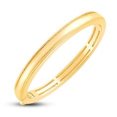 A lustrous high-polish center band is bordered above and below by dynamic milgrain trim in this exciting children's solid bangle bracelet 18K Yellow Gold The 4.0mm bangle bracelet secures with a fancy clasp Classic Bracelets With Decorative Band As Gift, Classic Formal Bracelets With Decorative Band, Classic Bracelets With Decorative Band For Formal Occasions, Classic Gold Bangle With Shiny Finish, Classic Gold Bracelet For Anniversary With Shiny Finish, Classic 14k Gold Bangle With Shiny Finish, Classic Gold Bracelet With Shiny Finish For Anniversary, Yellow Gold Bangle Bracelet With Decorative Band, Yellow Gold Bangle With Decorative Band