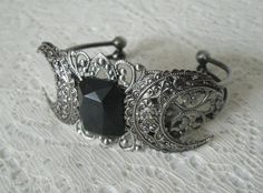 This beautiful silver plated filigree cuff bracelet has silver plated crescent moons and a faceted obsidian stone setting. Adjustable. Goddess Witchcraft, Wicca Goddess, Witchcraft Magic, Goddess Jewelry, Wiccan Jewelry, Obsidian Stone, Witch Jewelry, Pagan Jewelry, Triple Moon