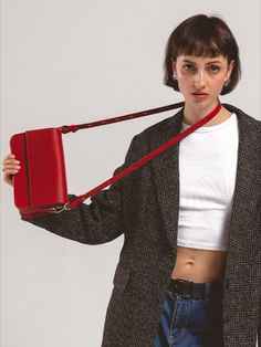 Elevate your style with our Leather Shoulder Bag in bold Red. Crafted for the fashion-forward individual, this bag seamlessly blends modern design with everyday functionality. Trendy Red Shoulder Bag For Fall, Red Office Bag For Fall, Modern Red Rectangular Satchel, Red Crossbody Flap Bag For Office, Red Satchel Box Bag For Office, Trendy Satchel Box Bag For Work, Versatile Red Rectangular Bag, Trendy Red Box Bag, Modern Red Tote Box Bag