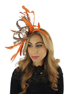 Gorgoeus loops with coque feathers Body measures about 8 inches wide With orange headband Unsure about colour? We send can send free colour samples anywhere in the world. Simply email us with colours and address. Samples can take a week to 10 days so be sure to ask early. Do you need your hat or fascinator in a hurry? We can deliver your hat or fascinator in 3 days via UPS to USA for $45 dollars via UPS and is a guaranteed service within 3 days. If you live in Australia, New Zealand or Asia, cos Elegant Hair Accessories For Races And Carnival, Elegant Hair Accessories For Carnival Races, Elegant Mini Hats With Feathers For Carnival, Elegant Headpieces For Races And Carnival, Elegant Mini Hat Headband For Costume Party, Elegant Hair Accessories For Carnival, Elegant Mini Hat With Headband For Costume Party, Fitted Headband Fascinator For Carnival, Elegant Fascinator For Carnival