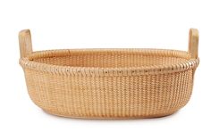 a woven basket with wooden handles on a white background