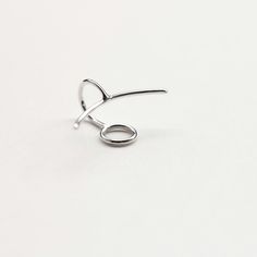 Handmade polished sterling silver ear cuff. A crescent line on the front, and a circle on the back to hold the cuff securely in place. Dimensions: 23x15mm Width: 1mm Sold: Individually or as a pair * Suitable for non-pierced ears. Also available in a longer version: https://www.etsy.com/listing/234077755/circle-long-line-sterling-silver-ear Visit my shop: http://www.etsy.com/shop/jewelrymirta © MIRTA Modern Single Earring With Open Ring Shape, Modern Open Ring Ear Cuff For Pierced Ears, Modern Open Ring Ear Cuff, Modern Open Ring Ear Cuff As Gift, Adjustable Sterling Silver Ear Cuff With Ear Wire, Minimalist Pierced Adjustable Ear Cuff, Minimalist Adjustable Pierced Ear Cuff, Modern Open Ring Earrings For Pierced Ears, Modern Single Ear Cuff Open Ring