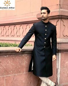 This is a Premium Sherwani by Golden Attire crafted from high quality fabric and imported materials. Our products are handcrafted by experienced tailors who make sure the that the stitching is precise, lining is proper and the overall product is sturdy enough to not go out of shape for more than a few years. Also all our products have extra margins in their length, sleeves, sides so it's easily alterable if your size changes after some time. To see more available colours and designs in this coll Elegant Nehru Jacket For Traditional Ceremonies, Elegant Long Sherwani For Traditional Ceremonies, Fitted Long Sherwani For Groom, Traditional Semi-formal Sherwani With Pallu, Long Bandhgala With Dabka For Groom, Elegant Long Bandhgala For Traditional Ceremonies, Fitted Long Bandhgala For Groom, Black Bollywood Nehru Jacket For Wedding, Bollywood Style Sherwani For Diwali