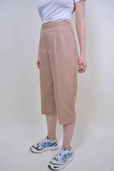 "90s beige chino capris, vintage women straight long shorts, Size W 34 Welcome to TARASCOMMON.ETSY.COM Unique clothing from the 20th century. Model tall 170cm. Size: FR/B - 44; Eur - 42; UK 16; Width - 39-49cm / 15.35-19.29inch; Length - 80cm / 31.49inch. All measurements are taken seam to seam while lying flat. Cotton. Polyester. This item is vintage, so it can have some defects. Additional photos can be send We are glad that you are interested in lots that we sell. Wish you a good shopping! FO Casual Beige Culottes For Work, Vintage Cropped Leg Bottoms For Summer, Vintage Cropped Leg Summer Bottoms, Cream Knee-length Bottoms For Summer, Cream Cropped Leg Pants For Summer, Beige Knee-length Shorts For Work, Beige Knee-length Bottoms For Spring, Retro Beige Pants For Workwear, Beige Bermuda Shorts For Work