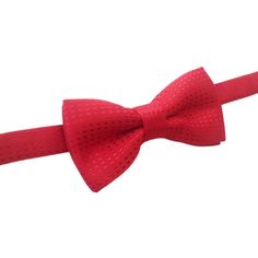 Handmade, red, double bow tie for special occasions ( Christmas/wedding). A handsome accessory for your little one!  Also available as a matching headband - specify in notes to seller please! Recommend: hand wash and hang to dry.  Keep Velcro clean to maintain its purpose.  Thank you for visiting my shop! Adjustable Red Suit And Tie Accessories For Wedding, Red Bow Tie For Black Tie Occasions, Red Dapper Tie For Wedding, Party Red Bow Suit And Tie Accessories, Red Bow Tie For Black Tie Events, Dapper Red Tie For Party, Red Bow Suit And Tie Accessories For Party, Red Bow Tie For Party, Dapper Red Bow Tie For Party