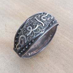 Handmade in Algeria. Gorgeous and rare silver bracelet. With an Algerian stamp and engravings. And in good condition. Bracelet opens .AnD fast shipping *weight: 52.4 gram *height: 2.8 cm If there is any other question send me a message and i will be very happy to answer it as son as possible. Visit my store: https://www.etsy.com/fr/shop/Berberjewelery Ornate Silver Hallmarked Bangle, Engraved Sterling Silver Bracelet For Wedding, Ornate Engraved Sterling Silver Bracelet, Vintage Silver Cuff Bracelet With Engraving, Vintage Silver Engraved Cuff Bracelet, Vintage Silver Cuff Bracelet Engraved, Silver Vintage Engraved Cuff Bracelet, Ornate Silver Cuff Bracelet With Engraving, Antique Engraved Silver Cuff Bracelet