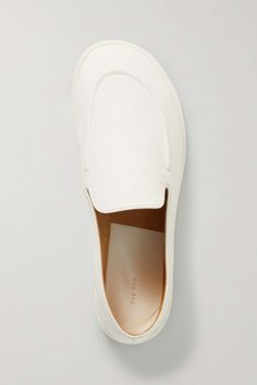 Find THE ROW Canal Leather Loafers on Editorialist. The Row's 'Canal' loafers have a slightly off-kilter round-toe shape and vamp. They're made from supple leather and look so chic grounding an all-white outfit. The Row Loafers, Leather Slip-on Loafers With White Sole, The Row Canal Loafer, Luxury White Low-top Loafers, Luxury Slip-on Loafers With White Sole, Luxury White Slip-on Loafers, Women's Rowing, Suede Slippers, All White Outfit