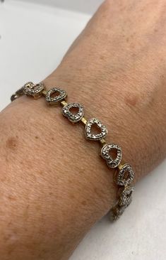 Vintage Diamond Heart Bracelet Golden 925 Sterling Silver https://www.etsy.com/listing/1201659123/vintage-diamond-heart-bracelet-golden?utm_source=crowdfire&utm_medium=api&utm_campaign=api Sterling Silver Bracelet For Anniversary, Fine Jewelry Sterling Silver Diamond Cut Bracelet For Anniversary, Sterling Silver Bracelet For Valentine's Anniversary, Anniversary Sterling Silver White Gold Tennis Bracelet, Sterling Silver Bracelet With Diamond Accents For Gift, Silver Tennis Bracelet With Diamond Accents As Gift, Silver Heart Cut Bracelets For Valentine's Day, Silver Bracelets For Valentine's Day Formal Occasion, Silver Bracelets For Valentine's Day Formal Event