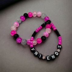 Friends by V of BTS beaded bracelet. Black and pink Seed and glass bracelet sets. Mic and match to create your perfect combination.  Please keep in mind that colors may appear different due to individual screen settings. Pink Friendship Bracelets With 8mm Round Beads, Trendy Letter Beads For Friendship, Pink Kpop Jewelry For Gift, Pink Kpop Jewelry Gift, Pink Kpop Style Jewelry Gift, Kpop Style Friendship Bracelets With Round Beads, Trendy Personalized Pink Beaded Bracelets, Pink Friendship Bracelet With 8mm Beads, Pink 8mm Beads Stretch Bracelet For Friendship