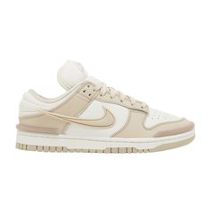 Find NIKE Wmns Dunk Low Twist 'sanddrift on Editorialist. The Nike Women’s Dunk Low Twist ‘Sanddrift’ pairs an understated palate with a revamped build. The leather upper features an off-white base with light tan overlays and a color-matched TPU Swoosh. Translucent bumpers reinforce the toe and heel, while stitched detailing enlivens the padded collar. A raised Nike logo decorates the elongated tongue. The rubber cupsole is unchanged from the original, featuring off-white sidewalls and a grippy Beige Air Max Cushioned Lace-up Sneakers, Nike Sporty Custom Sneakers In Beige, Cream Basketball Shoes With Boost Midsole For Streetwear, Nike Beige Custom Sporty Sneakers, Nike Sporty Custom Beige Sneakers, Cream Basketball Shoes With Cushioned Footbed For Streetwear, Cream Sporty Basketball Shoes For Streetwear, Nike Sneakers With Gum Sole For Light Sports, Nike Cream Custom Sneakers For Streetwear