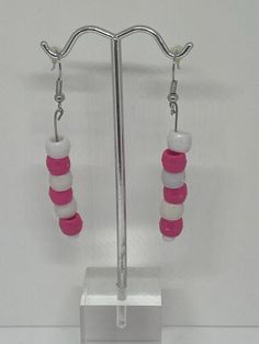 Pink and white set Enhance your jewelry collection with a touch of sophistication through our exquisite Pink and White Set. Expertly crafted using solid beads in lovely shades of pink and white, this gleaming and versatile accessory is certain to become a prized possession for any event. Material: Bracelet: Clear string Earrings: Stainless steel Color: Pink and white solid beads Gender: Women Type: Earrings and Bracelet Style: Glamorous l Osuna’s Jewelry Elegant White Beaded Earrings With Colorful Beads, Elegant White Dangling Beads, Pink Faceted Beads Jewelry, Pink Jewelry With Faceted Round Beads, Elegant Handmade White Beads, Handmade Elegant White Beads, Elegant White Earrings With Faceted Beads, Pink Large Beaded Dangle Earrings, Pink Dangle Beaded Earrings With Large Beads