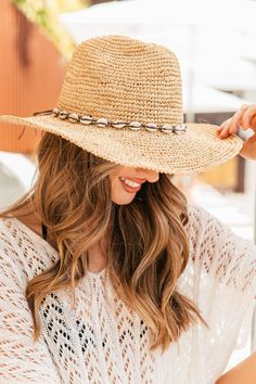 The cowboy hat you have all been waiting for is here... The Coastal Cowgirl Hat is promised to add that beachy-western edge to every look you're planning this summer. This straw hat is perfect for hot summer concerts, or laying out by the pool. Style with your favorite cowboy boots and just about ANY dress for that dream western outfit you've been craving. 100% braided Raffia with shell band Crushable, packable, travel-friendly Adjustable inner drawstring for the perfect fit Coastal Cowgirl Hat, Summer Concerts, Childrens Shop, Western Outfit, Cowgirl Hat, The Cowboy, Beach Collection, Coastal Cowgirl, Summer Concert