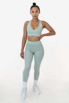 Our Poly Interlock Performance Legging has all the features you need for active use. This lightweight poly/spandex fabric features a smooth, shiny surface and is ideal for use in hotter weather. The high banded waist is flattering and designed not to dig into your skin. These bottoms also feature a hidden pocket to store whatever little things you might need on the go. Los Angeles Apparel, Performance Leggings, Hidden Pocket, Off Black, Hot Weather, Yellow And Brown, Leggings Fashion, Spandex Fabric, Little Things