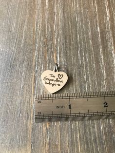 "Necklace comes heart charm engraved with wording of your choice ( up to 24 characters ) with your choice of customized bars with Names ( up to 11 characters, Capital letters are 2 Characters each ) and choice of Swarovski Crystal birthstones. Perfect Mother's Day gift. Pendants come on a 18 inch chain, I do have 24 by request. Please leave message with the names you would like stamped on each bar chosen and birth month choices :) If no requests left for heart this will come as This Grandma belo Sterling Silver Name Necklace With Birthstone For Personalized Gift, Mother's Day Custom Name Sterling Silver Birthstone Necklace, Mother's Day Engraved Nameplate Charm Necklace, Nameplate Charm Necklaces For Anniversary, Mother's Day, Mother’s Day Sterling Silver Birthstone Name Necklace, Personalized Grandma, Birth Month, Engraved Jewelry, Birthstone Necklace