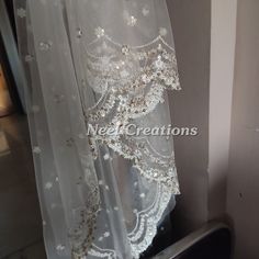 Beautiful embroidered dupatta with scallop border. Perfect for your wedding veil. It is very rich and classy dupatta. More dupatta here in our collection https://www.etsy.com/shop/neelcreations/?section_id=15880219 This Bridal Dupatta is embroidered on net with beautiful Scallop border. This can be your wedding dress chunni for Indian occasion wear for festival. This has perfect bling for you to look classy and ethnic at same time. NOTE : There might be slight color variation due to different co Wedding Lehenga With Lace Work For Diwali, Elegant Unstitched Shawl For Wedding, Elegant Net Wedding Veil, Elegant Wedding Veil In Net Material, Elegant Wedding Veil In Net, Elegant Wedding Veil Made Of Net, Traditional Drape Lace Lehenga With Sheer Dupatta, Wedding Festive Dupatta With Intricate Embroidery, Lace Lehenga With Sheer Dupatta In Traditional Drape