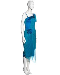 For Sale on 1stDibs - ▪ Issey Miyake blue silk mesh ▪ Draped mesh overlay ▪ Floral corsages ▪ Asymmetric neck and hemline ▪ Size JP 2 - Medium ▪ Spring-Summer 2005 ▪ 100% Silk Elegant Blue Mesh Dress For Summer, Elegant Blue Mesh Summer Dress, Elegant Blue Mesh Dress For Spring, Elegant Blue Mesh Dress For Party, Blue Sheer Silk Dress, Blue Asymmetrical Silk Dress, Fitted Blue Sheer Evening Dress, Blue Sleeveless Silk Chiffon Dress, Sheer Blue Evening Dress