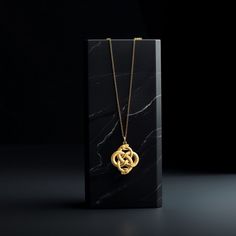 Elevate your style with our 14k Gold Ouroboros Pendant. This solid gold necklace showcases exquisite craftsmanship, symbolizing the eternal cycle of life. The 14 karat gold Ouroboros pendant is more than just jewelry; it's a fine representation of symbolism and ancient wisdom, also available in 18k yellow gold. PENDANT INFORMATIONThis pendant is made of real, solid gold.• Made in USA• Material: 14k or 18k solid gold• Finish: polished• Height: 1.15" (29,5 mm) | *includes the small circle, bail di Symbolic Yellow Gold Plated Medallion Necklace, Spiritual Yellow Gold Medallion Necklace With Large Pendant, Symbolic Ceremonial Necklace With Locket, Symbolic Locket Necklace For Ceremonial Use, Symbolic Ceremonial Locket Necklace, Symbolic Yellow Gold Box Chain Necklace, Yellow Gold Medallion Locket Necklace In Amulet Style, Gold Amulet Necklace With Box Chain, Elegant Yellow Gold Medallion Necklace With Locket