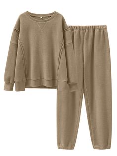 PRICES MAY VARY. Size - S=US(4-6), M=US(8-10), L=US(12-14), XL=US(16-18), see details in rich description. Features - This cozy loungewear set is crafted from fuzzy fleece fabric and includes a long-sleeve crewneck sweatshirt with side slits, a longer back hem, and jogger pants for a stylish yet comfortable look. Material - Made of 100% Polyester, this set features a soft fabric that feels like a warm hug. Perfect for lounging at home or stepping out in comfort. Occasion - The womens 2 piece set Pjs Outfits Winter, Winter Sets With Relaxed Fit And Long Sleeves, Relaxed Fit Long Sleeve Winter Sets, Winter Long Sleeve Relaxed Fit Sets, Comfortable Home Outfits, Long Sleeve Fleece Sets For Fall, Cozy Solid Color Long Sleeve Tracksuit, Cozy Long Sleeve Winter Tracksuit, Winter Cozy Long Sleeve Tracksuit