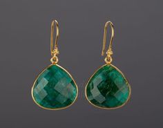 A pair of natural emerald stones set in gold plated bezel:1. Stone : emerald (natural gemstone)2. Stone size: 19 x 19 mm 3. earring total length ~ 36 mm4. bezel material: gold plated5. earring hook: gold plated6. if sending as a gift, a custom jewelry card printed with your own personalized message can be included. Packaged in my shop's premium gift box.Earrings of other stones/in other colors are available. Please browse my other earring listings or send you inquiry. Green Gemstone Earrings For Party, Pear-shaped Earrings For Anniversary With May Birthstone, Pear-shaped May Birthstone Earrings For Anniversary, Green Pear-shaped Earrings For Party, Anniversary Pear-shaped May Birthstone Earrings, Faceted Pear-shaped Earrings For Gift, Green Teardrop Earrings For May Birthstone, Green Teardrop May Birthstone Earrings, May Birthstone Teardrop Jewelry For Parties