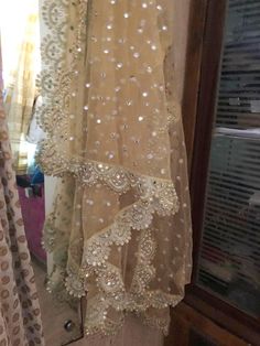 More dupatta here in our collection https://www.etsy.com/shop/neelcreations/?section_id=15880219 Net with embroidery Indian dupatta. It has beautiful golden border. Scallop border with dull gold color. ★ The mirror on all over net is not real. ★ It can be made in other colors and longer in length also. We can also change the border if you want. Approximate length 88-90 inches. We can increase length so please contact us if you want longer dupatta. These designer dupattas are very much in trend. Traditional Sharara With Sheer Dupatta And Kundan, Festive Anarkali Dupatta With Mirror Work, Anarkali Dupatta With Dabka Work For Diwali, Diwali Anarkali Dupatta With Dabka Work, Traditional Drape Sharara With Dupatta In Chinon, Sharara With Dupatta In Chinon And Traditional Drape, Traditional Sharara With Sheer Dupatta In Chinon, Traditional Chinon Sharara With Sheer Dupatta, Dola Silk Anarkali Set With Sheer Dupatta For Festivals