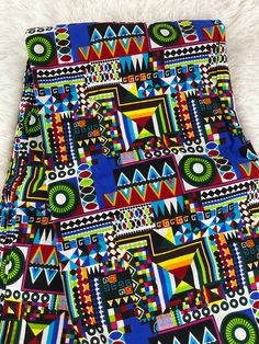 This African Fabric is high quality African print made from 100% cotton and it's 45 inches wide. It is used for making African Clothing, African quilts, & For Home decoration. FYI: Print is Double sided. The listing is for 1, 6 yards and Headwrap Each piece of fabric measures:  36in by 45in for 1 yard 216in by 45in for 6 yards 70in by 22in for Head wrap If you purchase more than one yard, you will receive one continuous piece. *If you require more than what I have listed, feel free to send me email. CARE INSTRUCTIONS: *DO NOT BLEACH *Hand wash with cold water and mild soap or Dry clean *Press with hot iron for a crispy look. Color may be different due to your monitor Ankara Fabric With Vibrant Patterned Print, Vibrant Patterned Ankara Fabric, Colorful Ankara Fabric With Multicolor Pattern, Multicolor Ankara Fabric With Colorful Pattern, Vibrant Print Patterned Cotton Fabric, Ankara Fabric With Geometric Pattern Prints, Vibrant Print Cotton Fabric, Cotton Fabric With Vibrant Patterned Print, Patterned Cotton Fabric With Vibrant Print