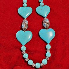 New Handmade With A Gift Of Earrings Questions? Leave A Comment Below! Blue Heart-shaped Jewelry With Colorful Beads, Adjustable Blue Heart-shaped Beaded Necklace, Adjustable Blue Heart-shaped Beaded Necklaces, Blue Adjustable Heart-shaped Beaded Necklaces, Adjustable Blue Heart Beaded Necklaces, Blue Jewelry With Heart Charm And Round Beads, Blue Heart Beaded Necklaces, Elegant Blue Beaded Necklace With Heart Beads, Adjustable Turquoise Necklace With Heart Beads