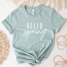 Hello Spring! This shirt is the perfect tee for spring season and everyday wearing. Beautiful gift for a friend or for treat yourself, this shirt is so cute and has a happy way to say: Welcome Spring Season! ❤ * DETAILS: T-shirts: Bella + Canvas - super soft and high quality shirts Material: Cotton/Poly Blend Design: is applied using high quality heat transfer vinyl and is applied to each shirt with a commercial grade heat press. Model: Unisex Sleeves: they are rolled up for display purposes only Printed in the USA *SIZING For sizing, please refer to the size chart in the pictures or contact us. Our t-shirts are unisex. Women should order one (1) size down if they prefer a slimmer fit. Size chart is included in images. *COLORS Color chart is available in images with all colors available. * Basic Letter Print Tops For Spring, Green Slogan Top For Spring, Spring Cotton Shirt With Screen Print, Spring Cotton Tops With Letter Print, Spring Graphic Tee With Screen Print, Relaxed Fit Letter Print Shirt For Spring, Cute Spring Tops With Funny Text, Spring Graphic Tee Shirt With Screen Print, Spring Cotton Shirt With Funny Text