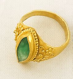 "Antique Chinese Qing Dynasty 22k Gold Navette JADEITE Ring size 6 Hand Crafted 5 grams The Navette Shaped Jadeite Measures: approximately 5 X 14mm The Jadeite is Hand Set in a sculptural Setting Hallmarked on the inside with a Chinese stamp The Qing dynasty , officially the Great Qing, also called the Empire of the Great Qing or the Manchu dynasty, was the last imperial dynasty of China, ruling from 1644 to 1912 with a brief, abortive restoration in 1917. It was preceded by the Ming dynasty and Traditional Yellow Gold Emerald Ring Gift, Traditional Gold Emerald Anniversary Ring, Ceremonial Yellow Gold Emerald Heirloom Ring, Ceremonial Heirloom Yellow Gold Emerald Ring, Traditional Gold Emerald Ring For Gift, Traditional Gold Emerald Ring As Gift, Antique Gold Emerald Cabochon Ring, Antique Gold Emerald Ring As Gift, Heirloom Gold Engraved Ring With Gemstone