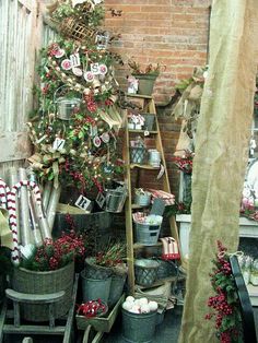 a room filled with lots of different types of christmas decorations and decor on the walls