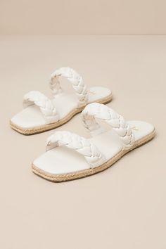 Step into summer with a fresh new look thanks to the Lulus Kennmar Off White Leather Braided Espadrille Slide Sandals! These smooth genuine leather sandals have a comfortable slide-on design, two braided straps, and a square toe bed. Sole is trimmed in beachy jute for a Boho-inspired finish. 0. 5" Rubber heel. Cushioned insole. Rubber sole has nonskid markings. Genuine leather upper. Balance man made materials. Imported. Lulus | Kennmar Off White Leather Braided Espadrille Slide Sandal Heels | S Woven Leather Sandals For Summer, Summer Leather Sandals For Beach Season, Summer Beach Sandals With Woven Leather, Flat Woven Leather Sandals For Beach, Leather Slides For Beach In Summer, Leather Slides For Summer Beach, Summer Sandals With Braided Straps For Outings, Leather Slides For Summer Beach Outings, Sandals With Braided Straps For Summer Outings